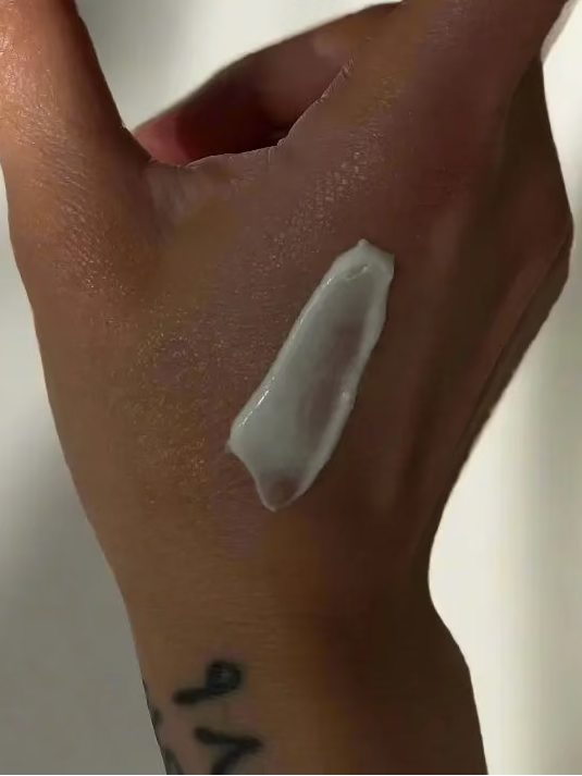 Luxury organic buffalo milk face moisturizer by KOHLBRA, showing a jar of creamy skin cream with natural ingredients.